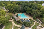 Three swimming pools and playground.