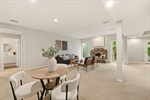 Family rec room with fireplace.
