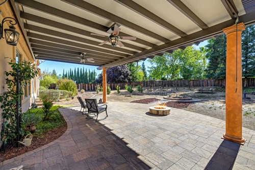 4095 Kingsbarns Drive Roseville CA 95747 backyard covered patio with fire gr97