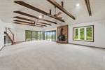 Open beam ceiling with refreshing fans.