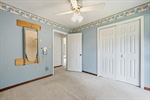 Double closet and lighted fan.