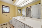 Second full bath with expansive vanity.
