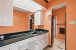 Ensuite full bath with vanity area.