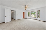 Primary bedroom suite with bay window.