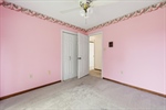 The 4th bedroom also features a double closet.