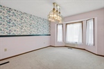 The space is complete with a lovely bay window.