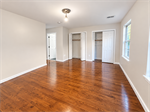 Bright Empty Room with Open Closets