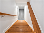 Bright Oak Stairway to Minimalist Landing