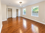 Bright Empty Bedroom with Built-In Closets