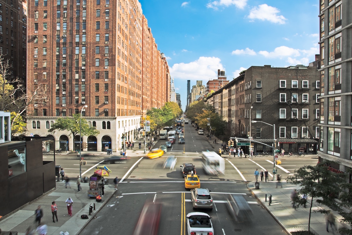 cars at busy intersection in New York City