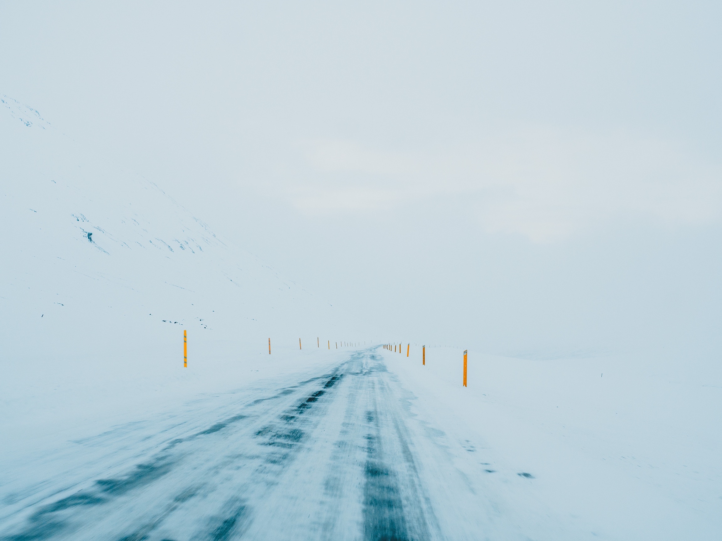 road coated by snow