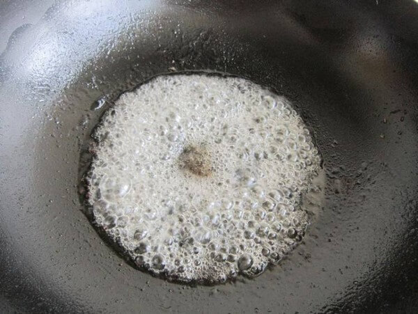 Bring the sugar to a boil to make a syrup;