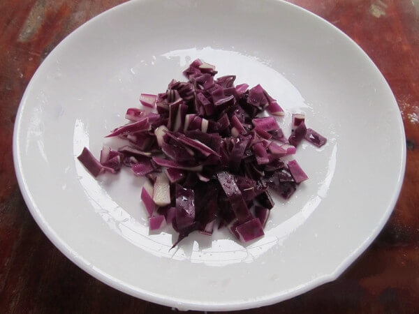 Chop the purple cabbage.