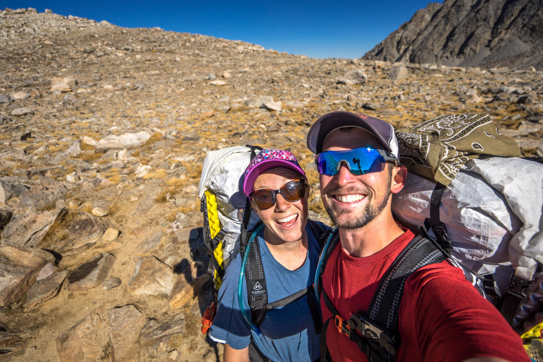 Finally at the pass! We're both feeling pretty tired and beat up at this point. Definitely forced smiles here.