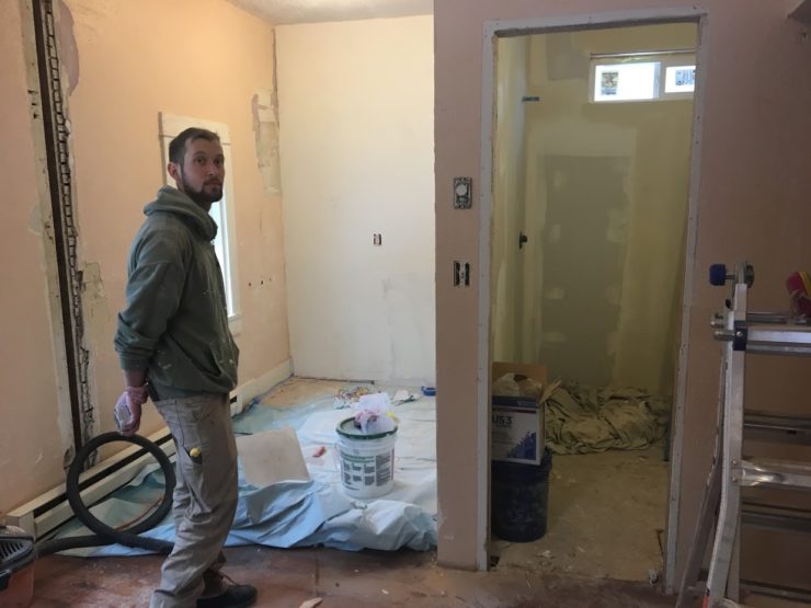 An exasperated Will standing in the middle of construction chaos.