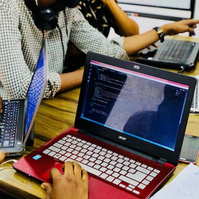 Photo of why attending a university-based coding bootcamp increases your chances of getting a job