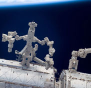 Picture of Dextre Robot Repairing ISS