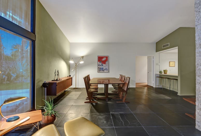 the dining room of gerald casales palm desert home flows into the living room and is partially open to the kitchen - Interior Design Palm Desert the dining room of gerald casales palm desert home flows into the living room and is partially open to the kitchen - Interior Design Palm Desert