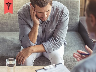 therapist with man in therapy