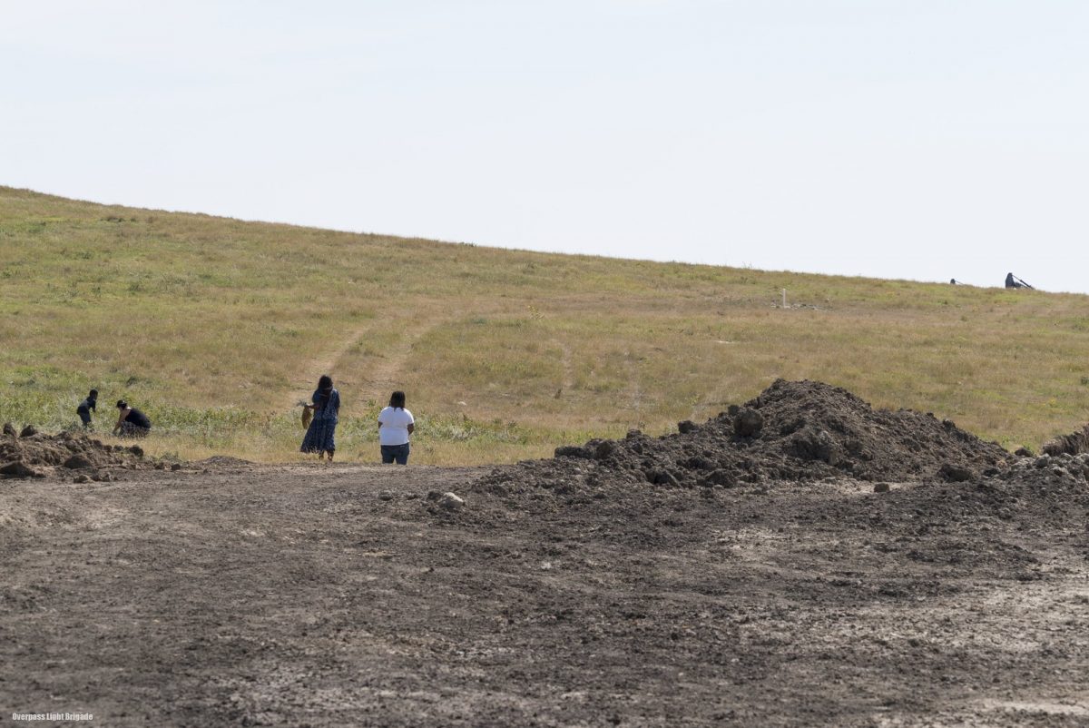 Dakota Access pipeline construction desecrates ancient burial grounds near Standing Rock Reservation in North Dakota.