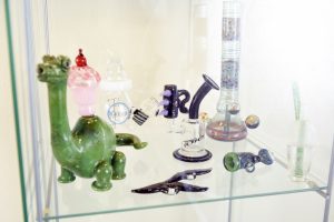A case displays various glass ware at Christina Blea's Dabulous Nail Bar, at her home in Richmond, Calif., on Wednesday January 31, 2018.