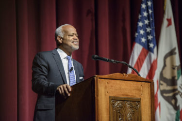 Harry Elam at lectern at Family Weekend program for families of first-year students