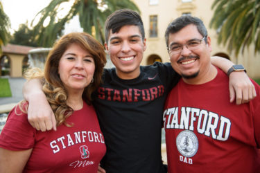 Freshman Javier Covarrubias with his parents Maria and Javier Covarrubias.