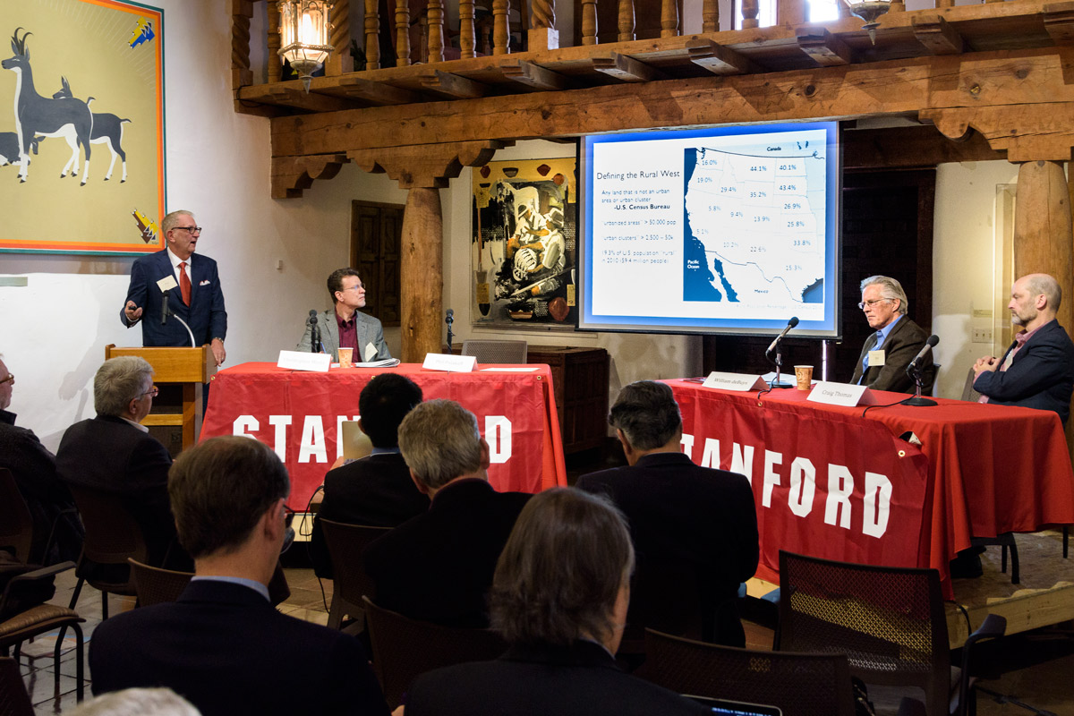 Phil Polakoff (left), consulting professor of medicine at Stanford, leads a discussion on the health challenges facing the rural west.