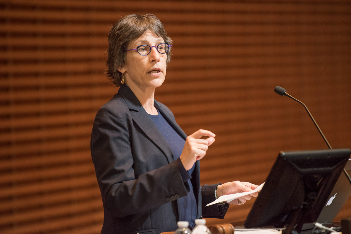 Debra Satz at a lectern