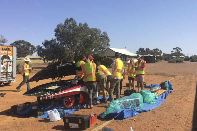 Students working on solar car