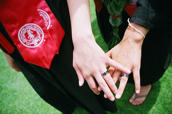 dish_boycott_news Chrysanthe Tan ('09), left, and Alexis Ortega ('09) show off their Equality rings at Commencement.