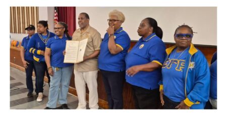 Senator Kevin S. Parker presents a New York State Legislative Resolution to members of the Eta Nu Sigma Brooklyn Alumnae Chapter of Sigma Gamma Rho Sorority, Inc. at WaterPalooza 26, held at Bushwick Campus on May 30, 2026.