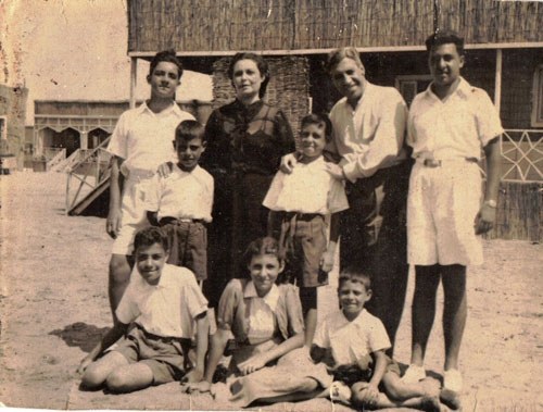 Rass el-Barr 1949. The Jewish upper middle-class of Cairo used to live in this fancy, unique and extremely enjoyable Sea Resort on the Mediterranean, during the whole summer. (Victor & Esther Vidal with their seven children. Made Aliya on 1950, after being confiscated of all their assets).