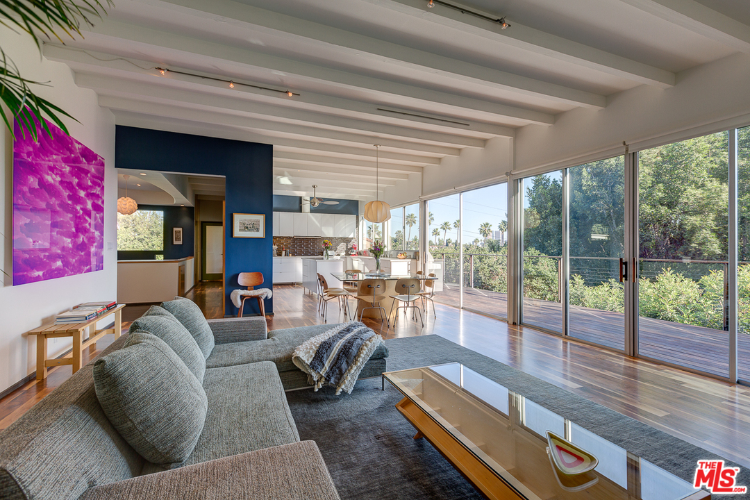 Tucked into a quiet and coveted Silver Lake enclave, this 60s mid-century modern has been remodeled and reimagined with an architect's touch