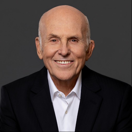 John H. Tyson  Chairman of the Board