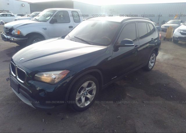 из сша 2014 BMW X1 WBAVM1C51EVW49014