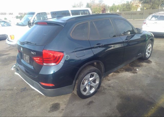 цена в сша 2014 BMW X1 WBAVM1C51EVW49014