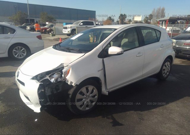 из сша 2014 TOYOTA PRIUS C JTDKDTB33E1575054