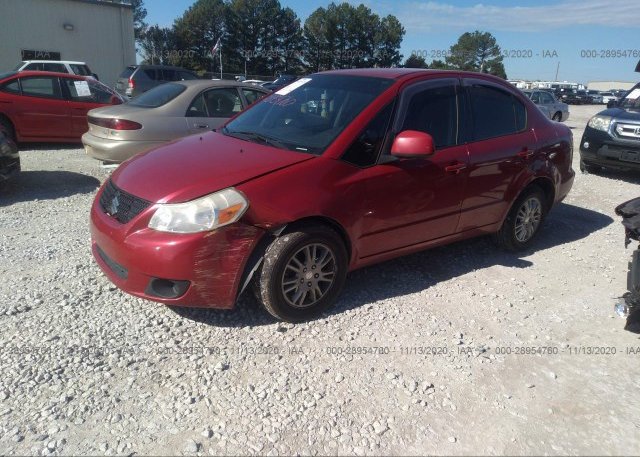 из сша 2012 SUZUKI SX4 JS2YC5A39C6300126