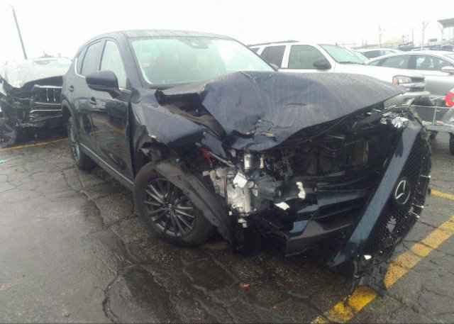 2021 MAZDA CX-5 (VIN: JM3KFBCM1M1424165)