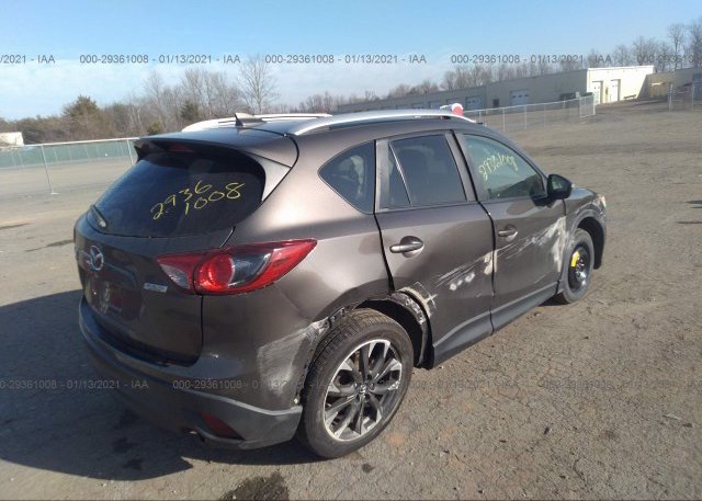 цена в сша 2016 MAZDA CX-5 JM3KE4DY5G0830198