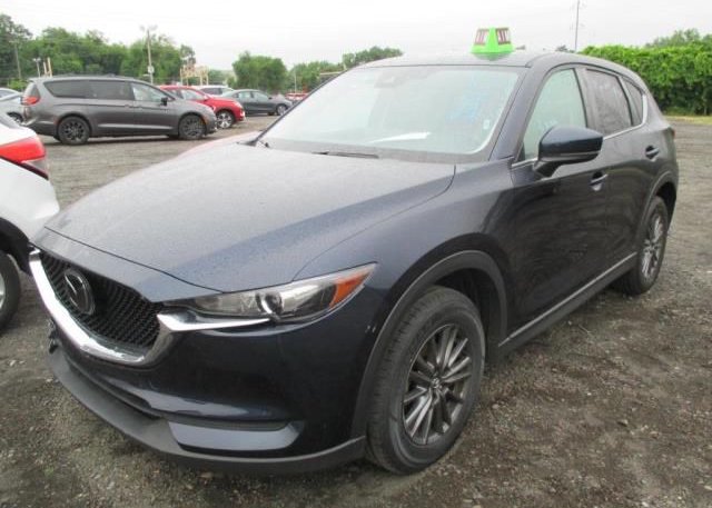 2021 MAZDA CX-5 (VIN: JM3KFACMXM0330124)