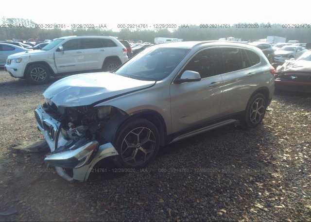 из сша 2018 BMW X1 WBXHU7C32J5H41332