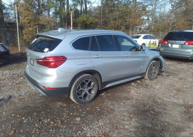 цена в сша 2018 BMW X1 WBXHU7C32J5H41332