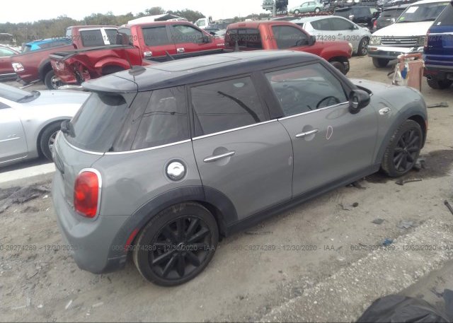 цена в сша 2016 MINI COOPER HARDTOP 4 DOOR WMWXU3C53G2D30063