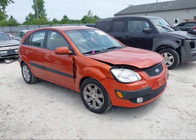 KNADE243296481380 2009 KIA RIO5