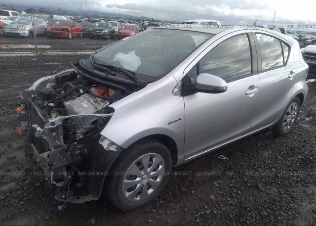 из сша 2014 TOYOTA PRIUS C JTDKDTB32E1572601