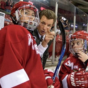 Hockey Coach taking to Player