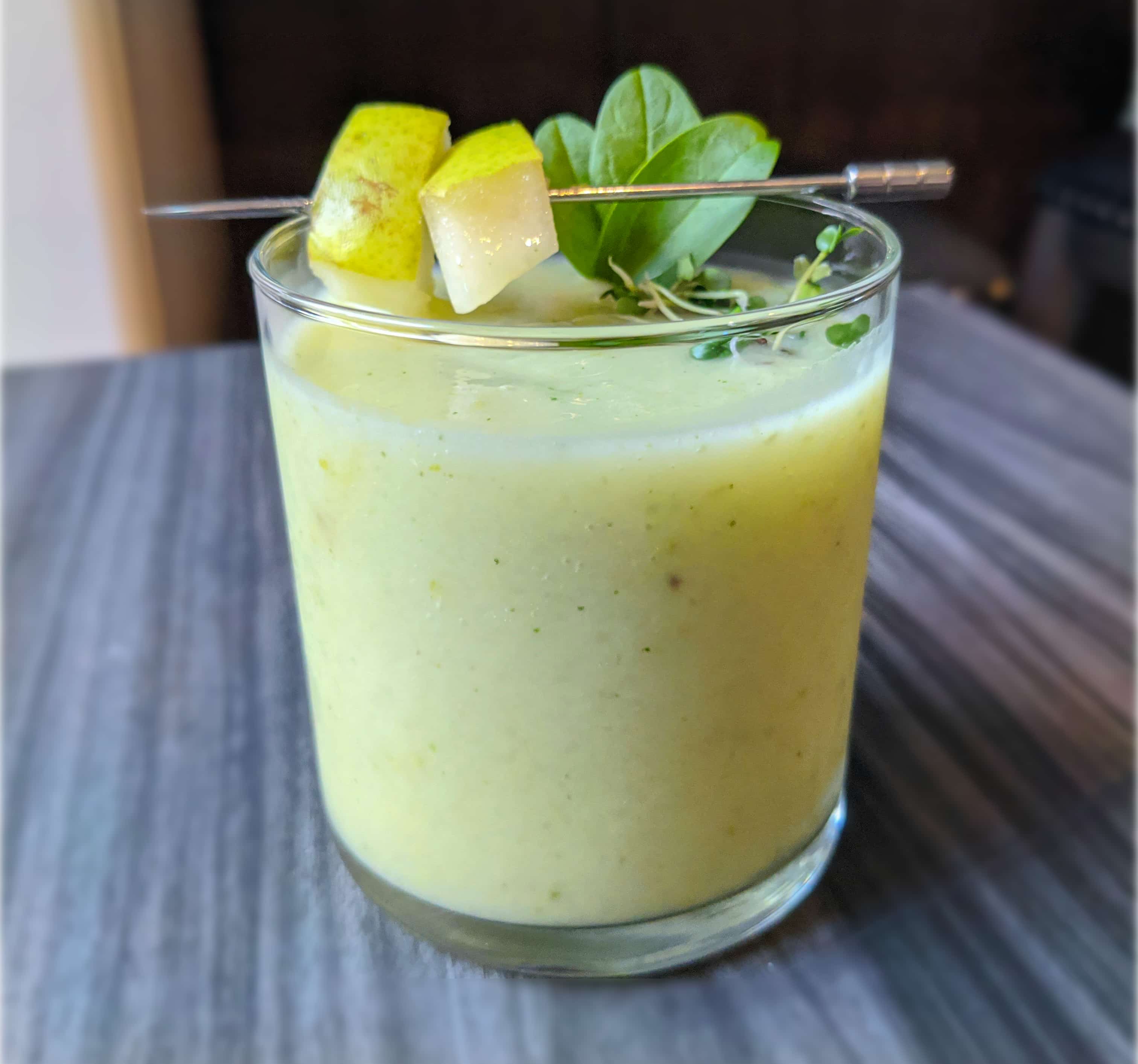 image of pear spinach smoothie with radish sprouts