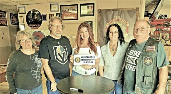 American Legion Paradise Post 149 presents a license plate to NASCAR Truck Driver